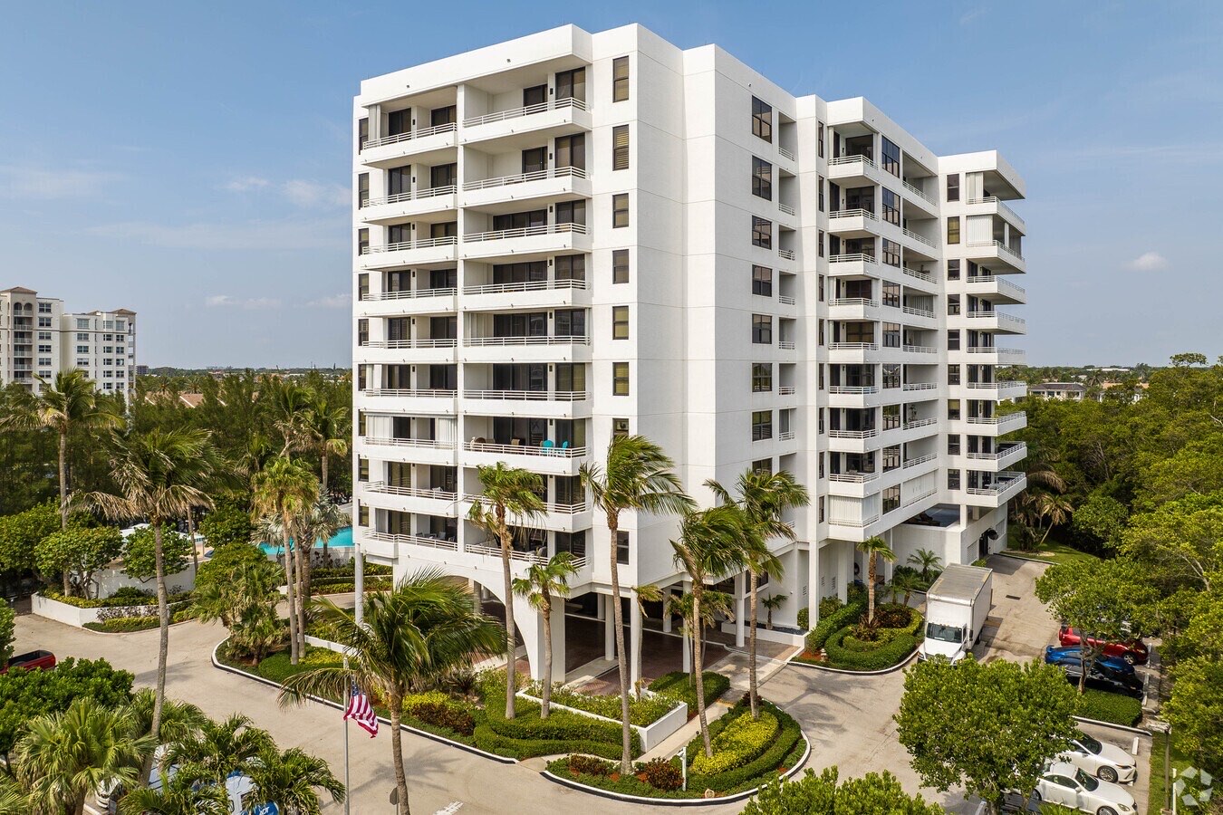 Aerial view of the Casuarina residential building within its South Florida coastal landscape