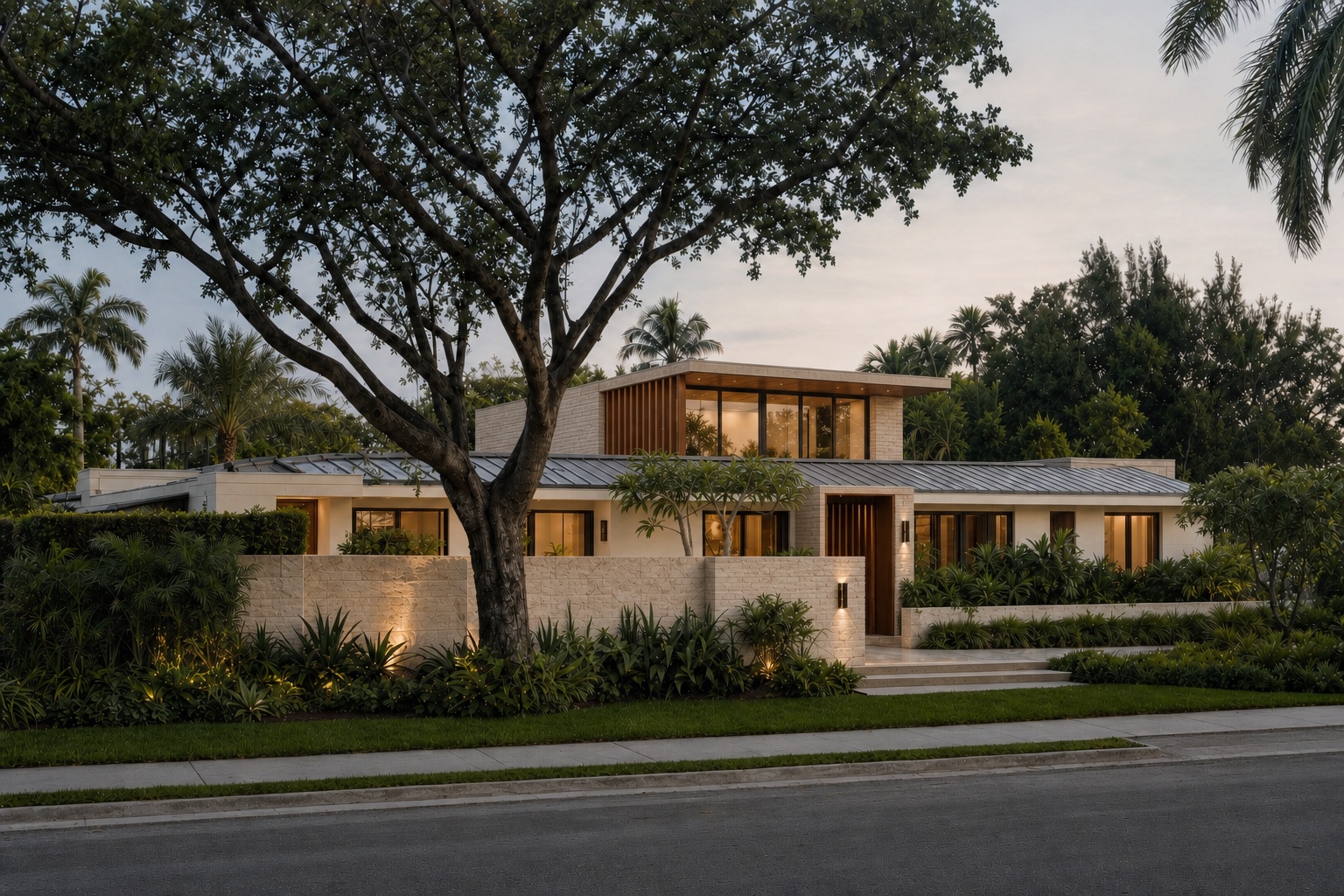 Transformed Miami home retaining its original single-story identity and mature tree with a distinct stone-and-glass upper-level addition composed as one architecture