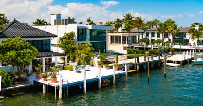Design-Build Construction in Miami: a team reviewing architectural plans and coordinating design and construction