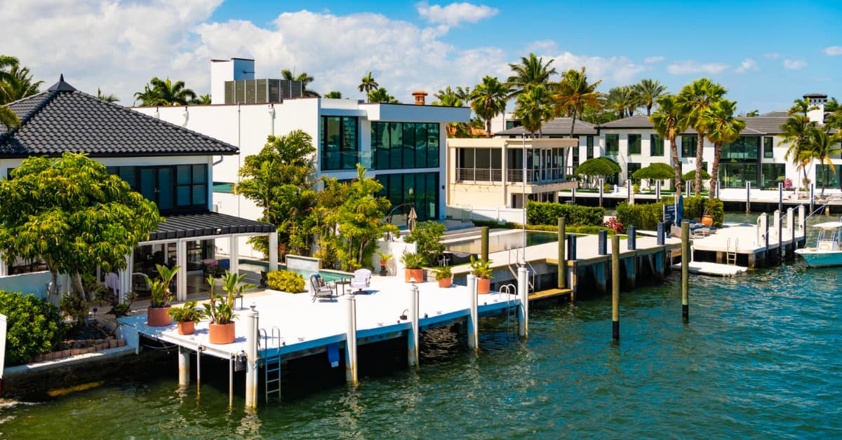 Design-Build Construction in Miami: a team reviewing architectural plans and coordinating design and construction