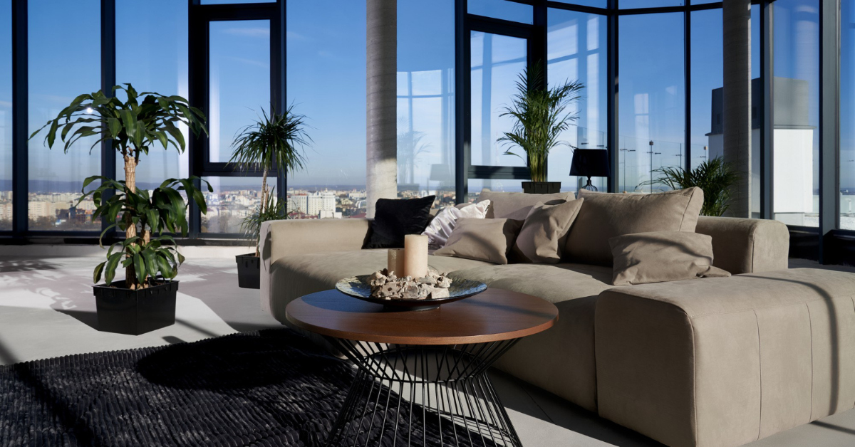 Custom architecture in Miami featuring a luxury living room with floor-to-ceiling windows and panoramic city views